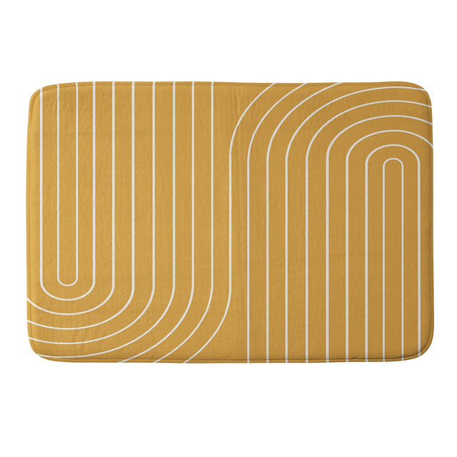 https://cdn.shopify.com/s/files/1/2519/3298/products/colour-poems-minimal-line-curvature-gold-bathmat-whitebg_640x.jpg?v=1650419772