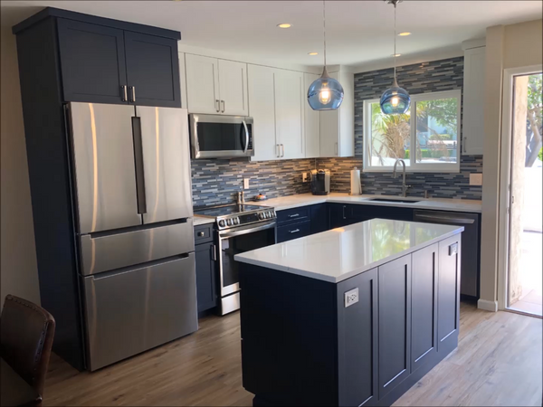 image of completed kitchne renovation with blue and white accents