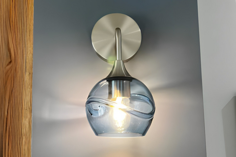 closeup of Blue glass globe sconce in hallway