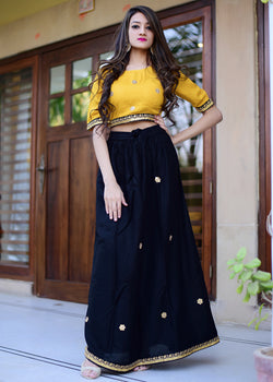 black skirt yellow top