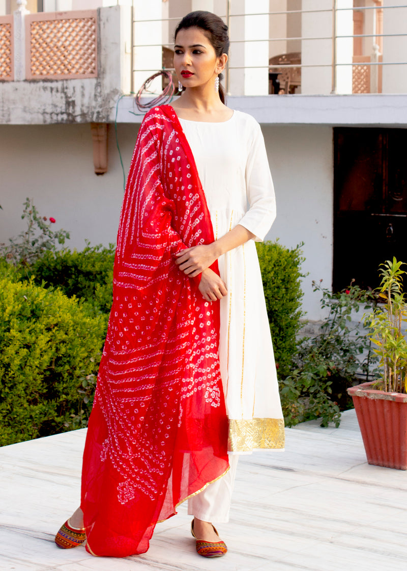 white anarkali suit with red dupatta