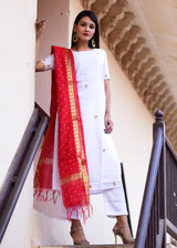 white dress and red dupatta