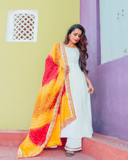 white suit with colourful dupatta