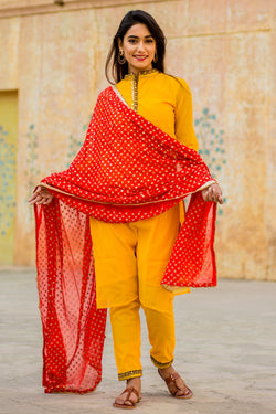 yellow dress with red dupatta