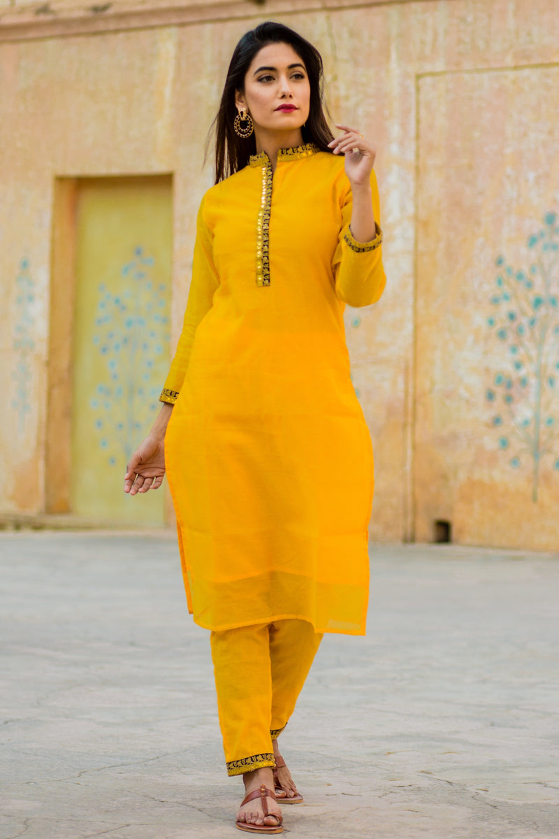 yellow dress with red dupatta