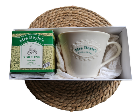 Belleek mug and box of Mrs Doyle's tea