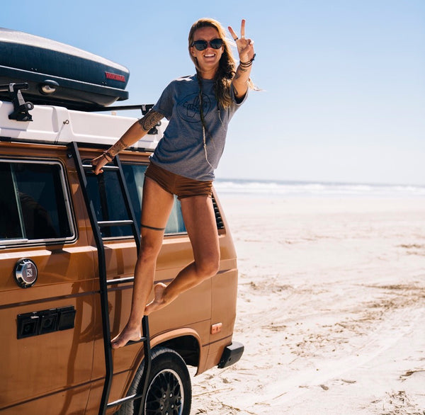 digital nomad sitting in her van