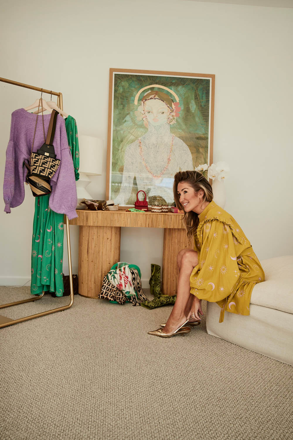 Stephanie Davies, La Boheme Founder in gold shoes and wearing Solstice Chartreuse
