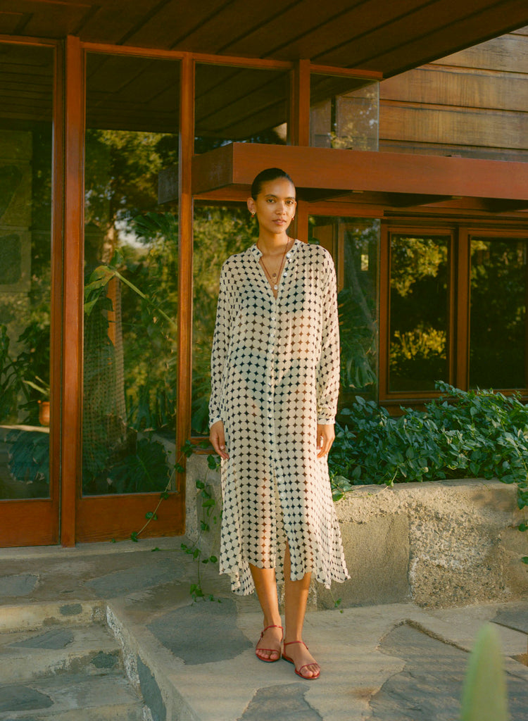 Model wearing checkered dress