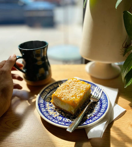 mango toasted coconut (and a little cardamom) cheesecake