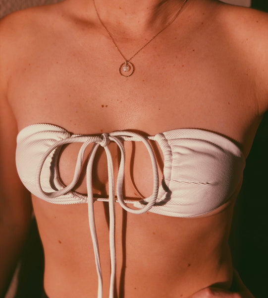 String bikini top tied into bandeau