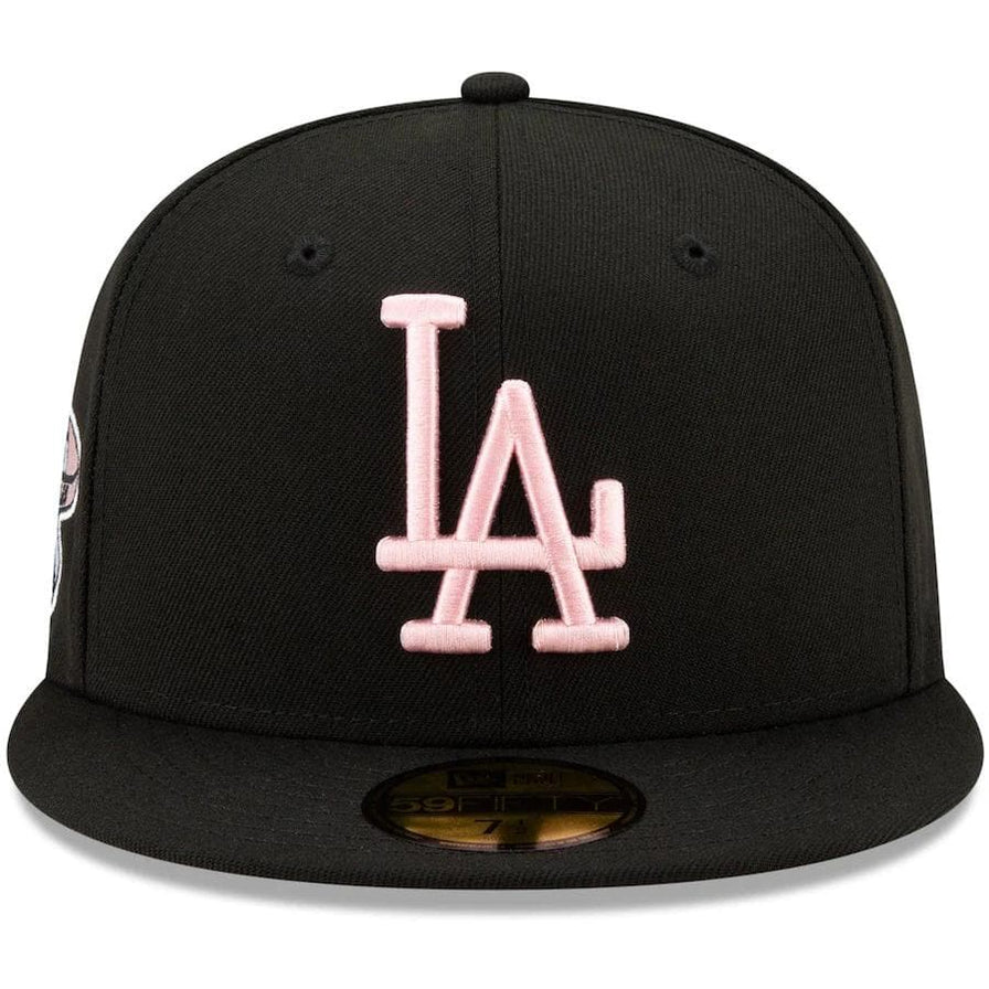 light blue fitted hat with pink brim