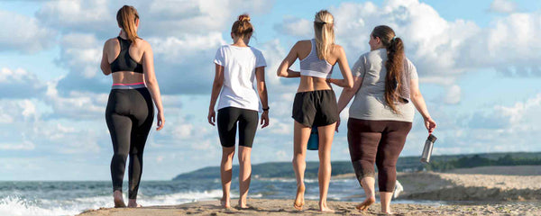 Women walking on beach