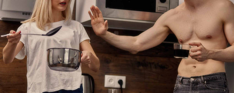 Couple argues in kitchen