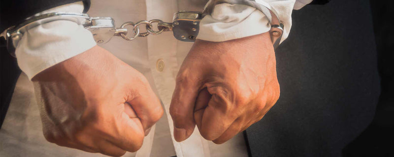 Handcuffed businessman