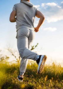 Man jogging in field