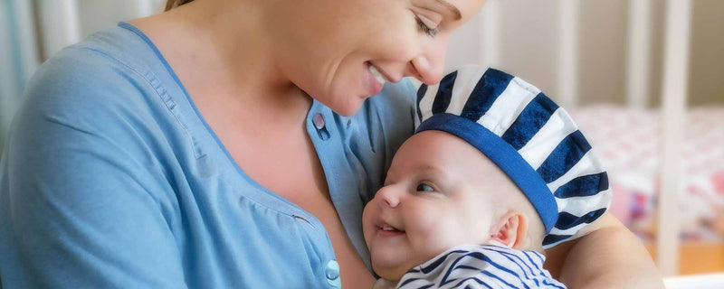 Mother holding mariner baby