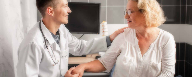 Doctor with elderly patient