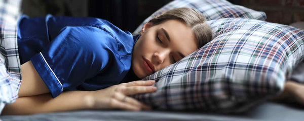 Sleeping woman on pillow