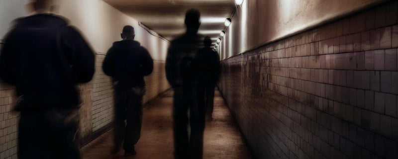 Street walking gangs in dark hallway