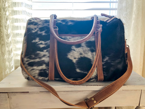 myra cowhide duffle bag