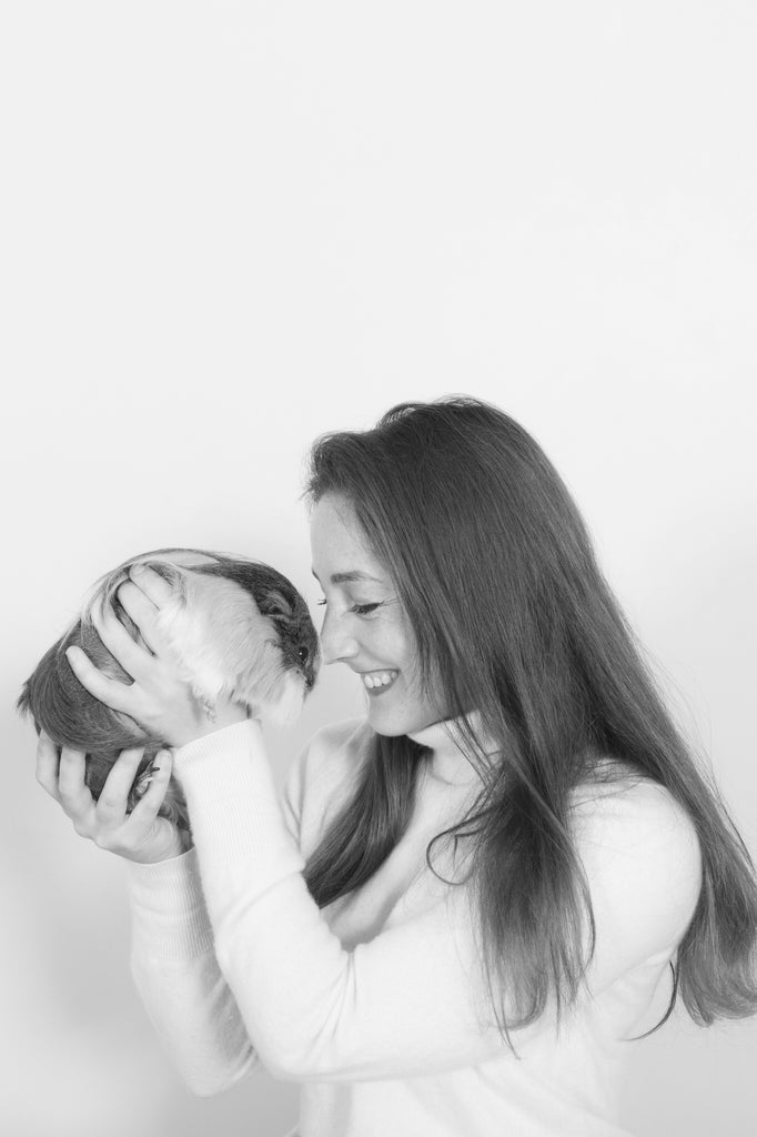 Kavee's founder and CEO Clementine has a soft spot for animals. Pictured is Clementine holding a guinea pig.