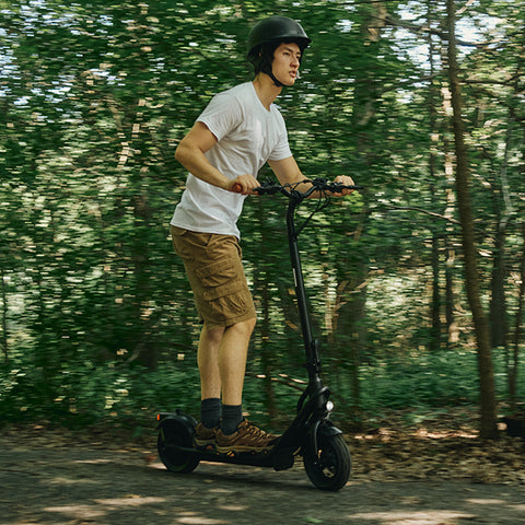 person riding copperhead e-scooter