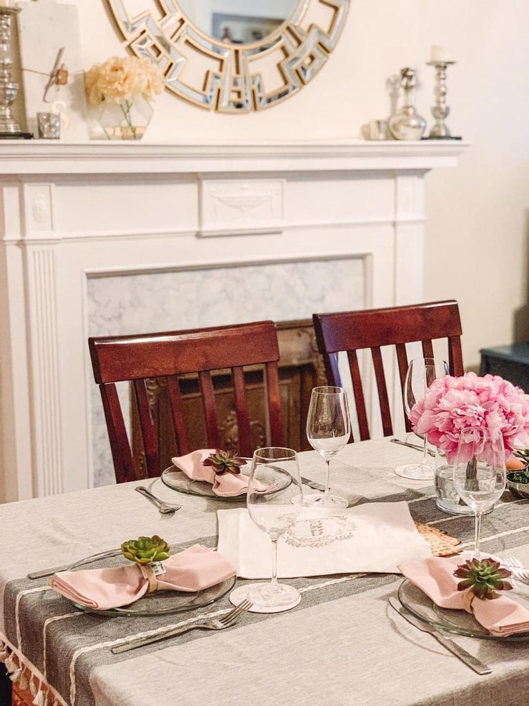 Setting the Passover Seder table- Peace Love Light Shop/ Ariel Loves