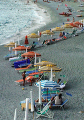 Deck chairs and umbrellas lined the beach at Monterosso