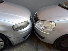 Cars parked nose to nose in Cortona