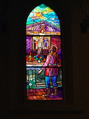 A stained glass window in the church at Rivotorto