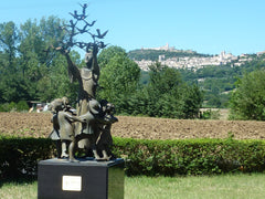 Children and birds frolic around this statue of St Francis