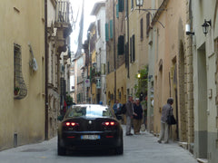 Watch out for cars whizzing through the narrow streets of Italian towns