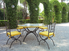 Lava stone table and chairs in a garden setting