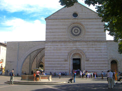 The basilica of Saint Clare in Assisi is built from pink and white stone from Mount Subasio