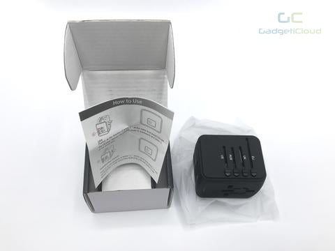 Universal travel adapter with USB port - GadgetiCloud open package eu us uk au plugs