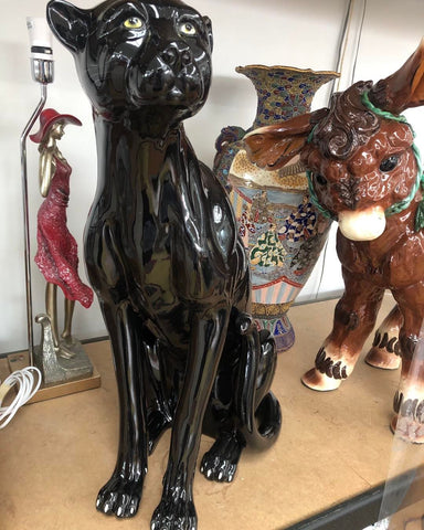 Italian vintage ceramic black panther repair after