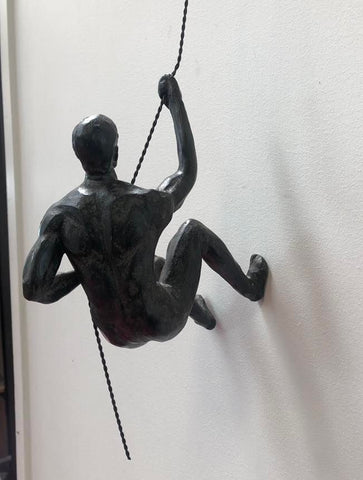 climbing figurine after repair