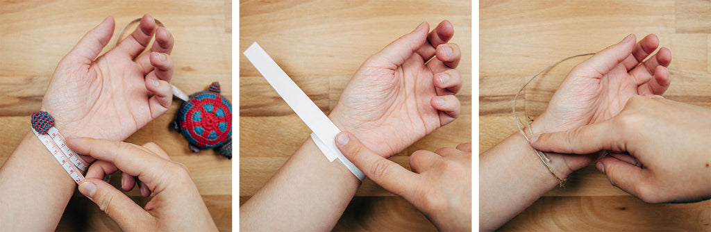 Das Maßband, den Papierstreifen oder die Schnur um dein Handgelenk wickeln.