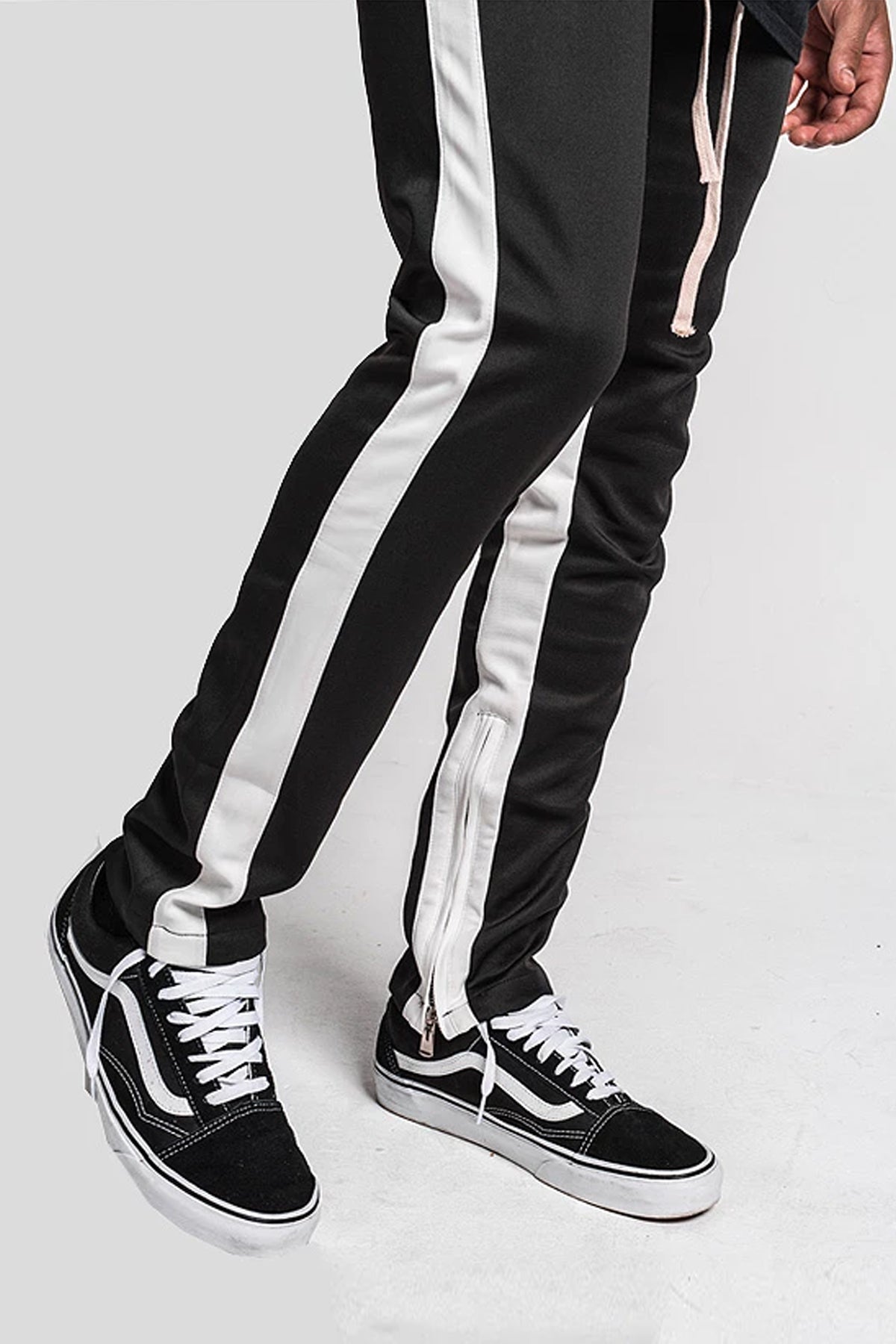 black pants with white stripe on side