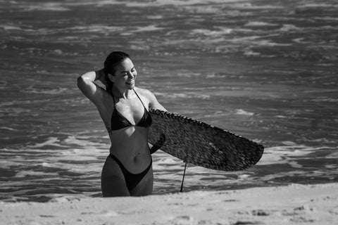 Samantha Harding CEO Sahar by Samantha Harding surfboard leopard happy model