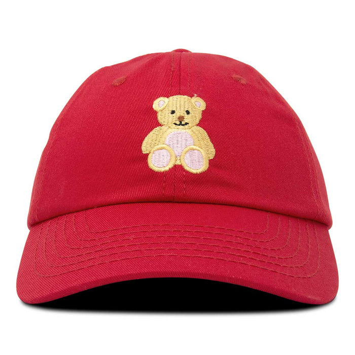 red teddy bear with cap