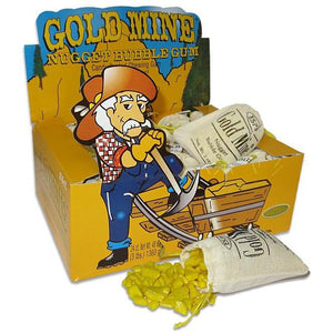 Front view of display box for Gold Mine Nugget Bubble Gum with bags of gum in box and one laying out on its side with gum spilling out.