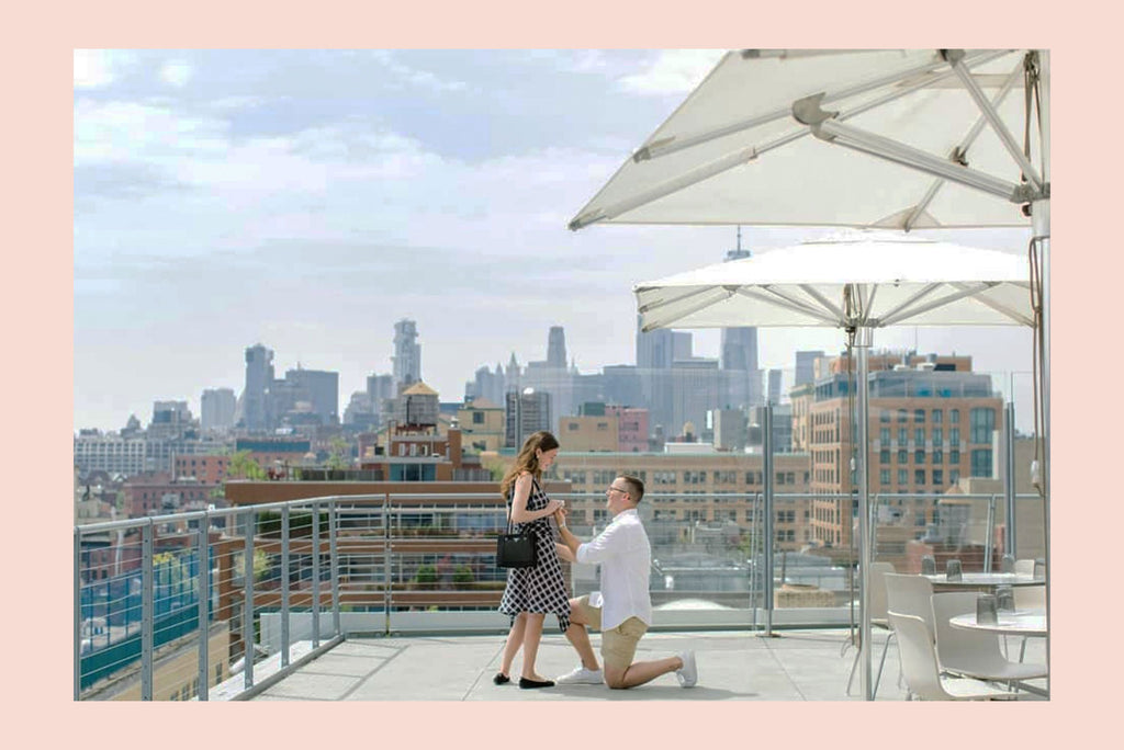 Man proposing on a rooftop in New York City