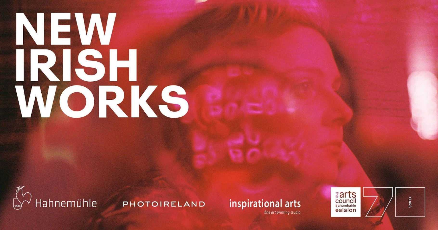 "New Irish Works" on Pink/Red Image, with sponsors listed: Hahnemühle, PhotoIreland, Inspirational Arts, and The Arts Council