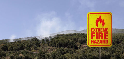 Fire hazard sign and wildland fire smoke