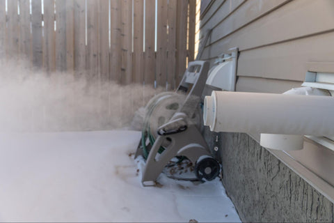 furnace exhaust pipe blowing steam outside