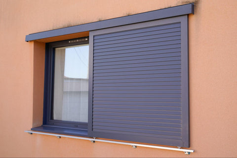 Window with metal shutters