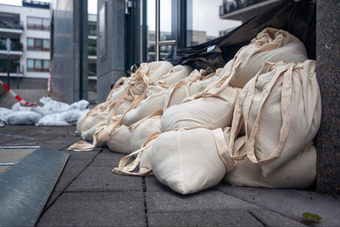 Sand bags outside shop preparing for flood