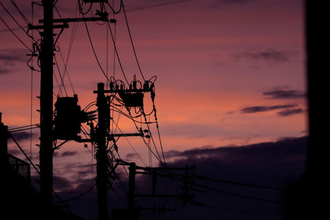 powerlines with sunset in the background